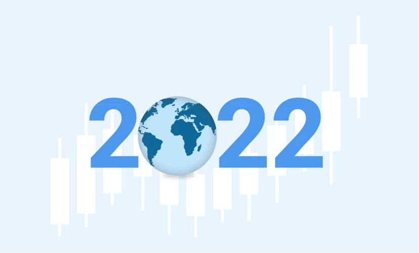 Ein Bild des Jahres 2022 mit einer Weltkugel und Wirtschaftsindikatoren im Hintergrund