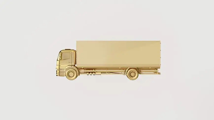 un camion en or sur fond blanc représentant les livraisons d'or physique