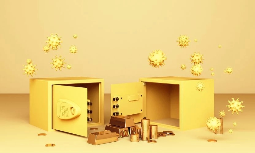 physical gold bars and coins with omicron covid-19 viruses floating over gold safe boxes
