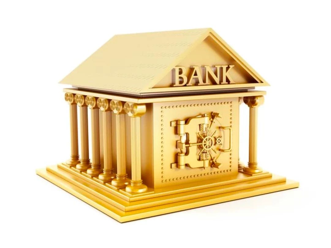 Goldankauf durch eine Zentralbank, dargestellt in einem Bild mit einem goldenen Bankgebäude mit Säulen und einem eingebauten sicheren Tresorraum