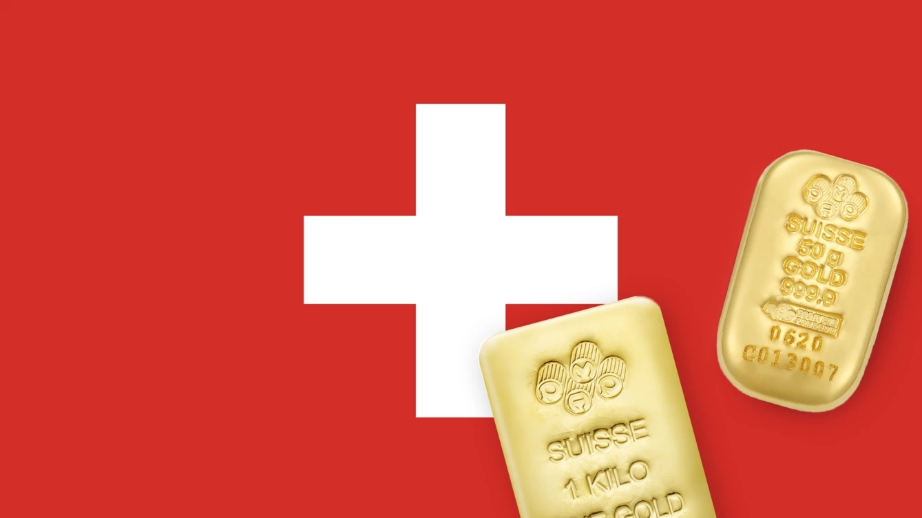 Lingotti d’oro colati PAMP Suisse sulla bandiera svizzera.