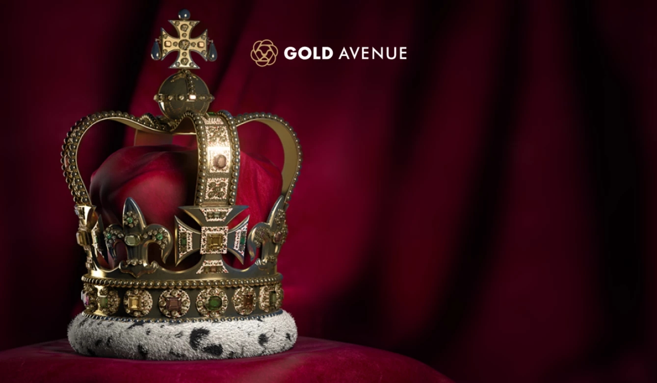 La Corona di Sant’Edoardo su uno sfondo in velluto rosso con il logo GOLD AVENUE.