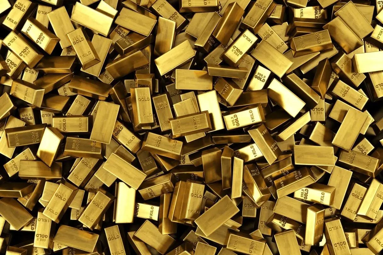 A pile of 1 kg gold bars signifying central banks regaining appetite for buying gold and top economists seeing gold as the best protection against inflation.