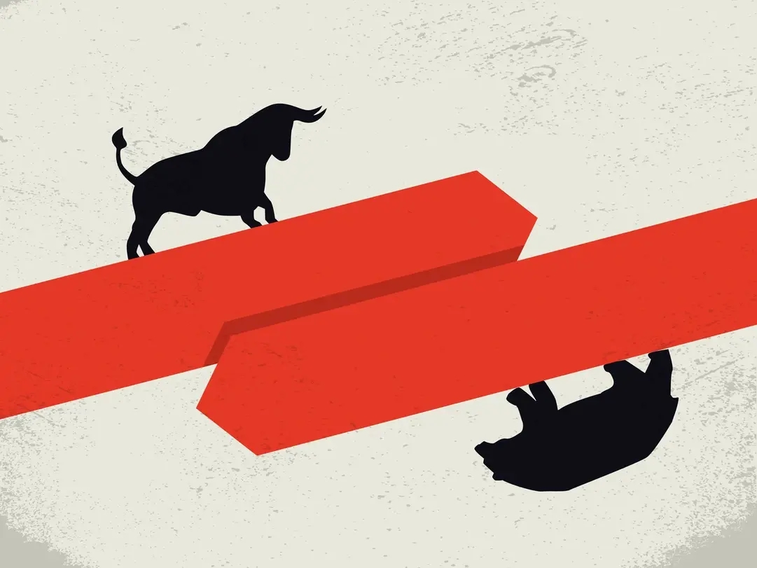 bull for the gold bull market represented standing on a red arrow going up and bear for the bear stock market represented standing upside down on a red arrow going down