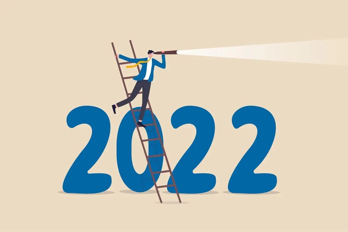 gold price outlook 2022 with a cartoon man lighting a torch up on the ladder