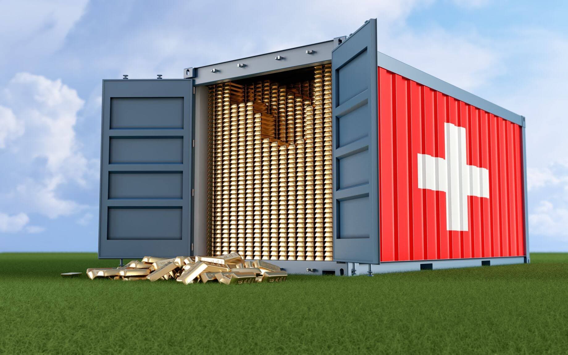 Die Schweiz hat das meiste Gold pro Kopf als jedes andere Land der Welt, wie das Bild eines Tresors mit der Schweizer Flagge und Goldbarren darin zeigt Die Schweiz hat das meiste Gold pro Kopf als jedes andere Land der Welt, wie das Bild eines Tresors mit der Schweizer Flagge und Goldbarren darin zeigt