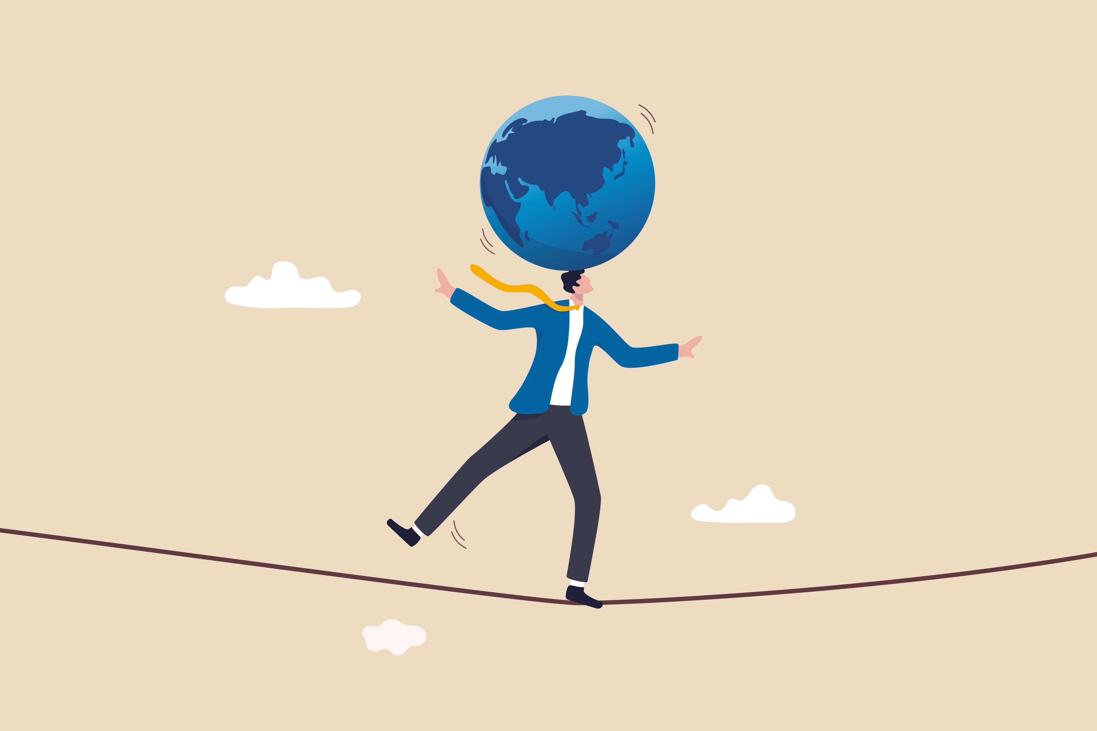 Guerre Israël-Hamas: doit-on craindre une crise économique mondiale? Un entrepreneur acrobate essaie de faire tenir le globe terrestre en équilibre sur sa tête.