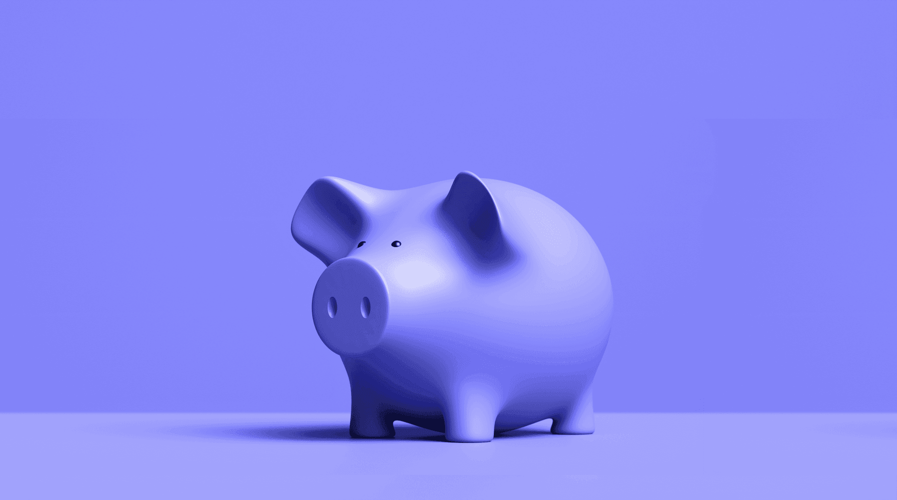 Détox financière: Comment économiser de l'argent après les vacances d'été Une tirelire en forme de cochon violet