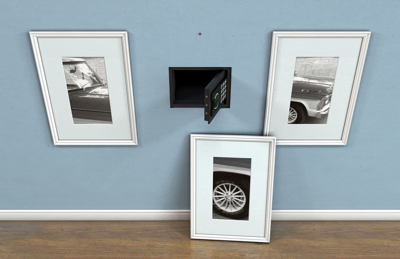 a wall safe to hide physical gold and silver covered with a picture frame a wall safe to hide physical gold and silver covered with a picture frame