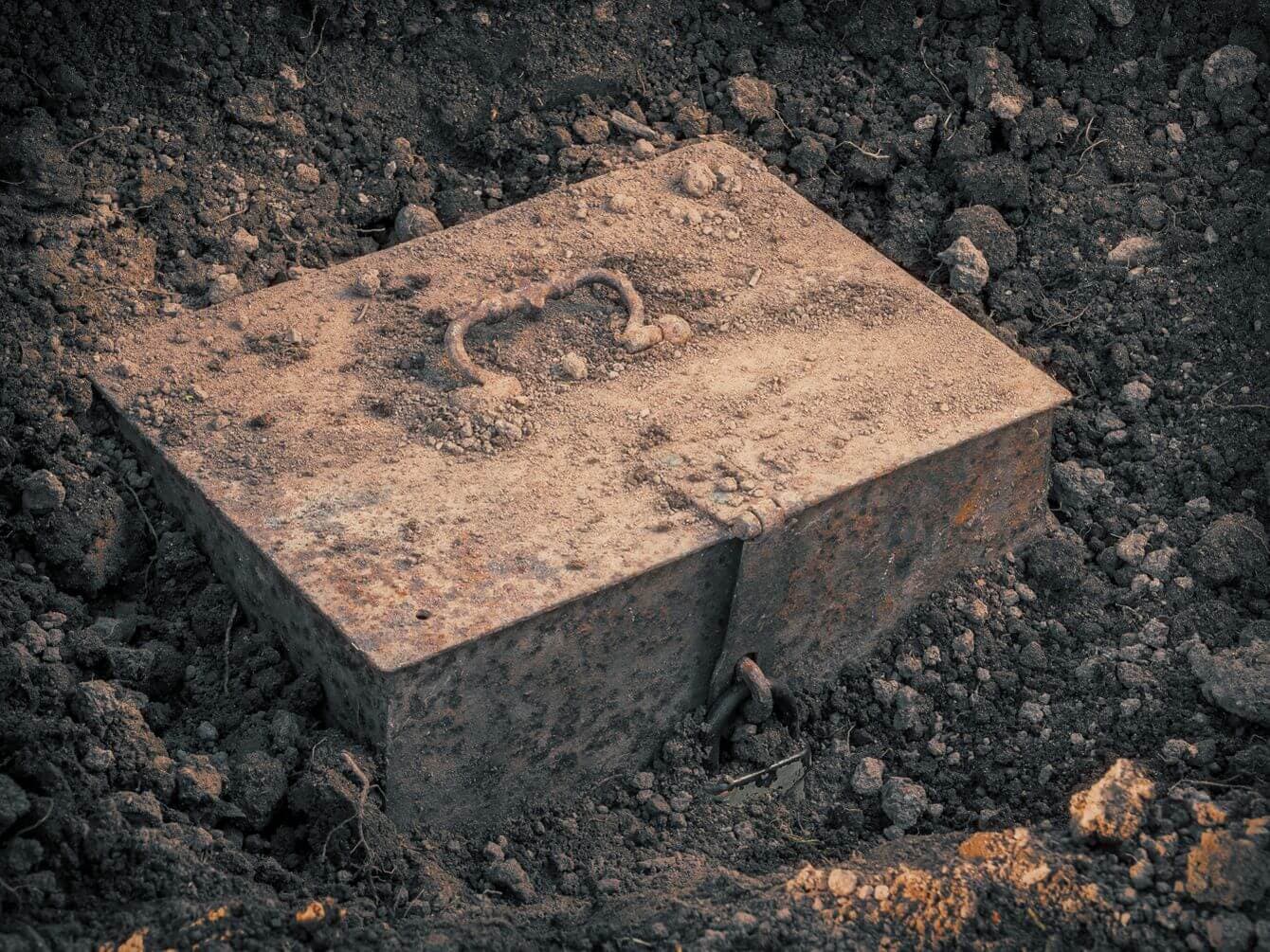 a treasure box used to hide physical gold buried in the ground a treasure box used to hide physical gold buried in the ground