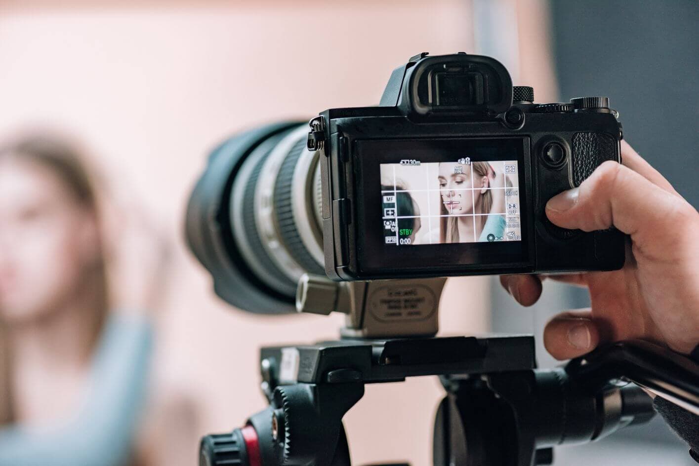 taking picture of a woman taking picture of a woman