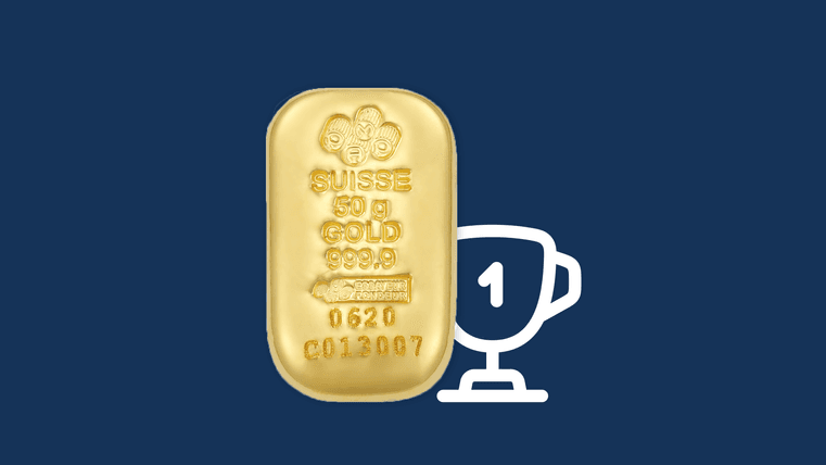 Une barre d'or et une tasse sur fond bleu Une barre d'or et une tasse sur fond bleu