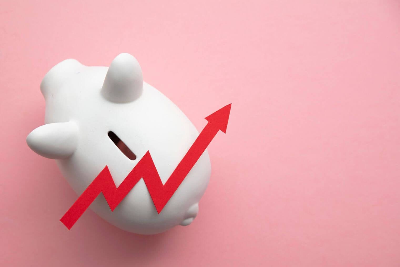 a piggy bank with a rising arrow a piggy bank with a rising arrow