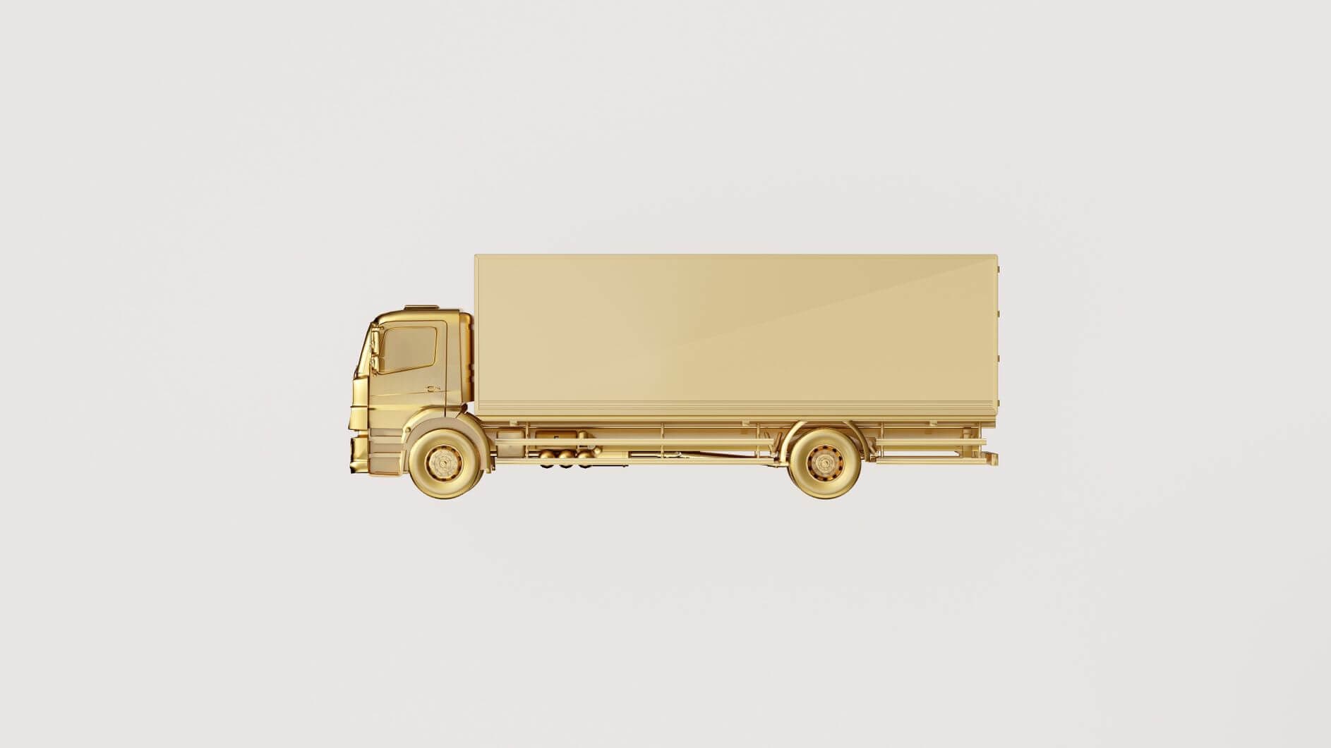Pourquoi les livraisons d'or n'ont-elles jamais été aussi élevées? un camion en or sur fond blanc représentant les livraisons d'or physique