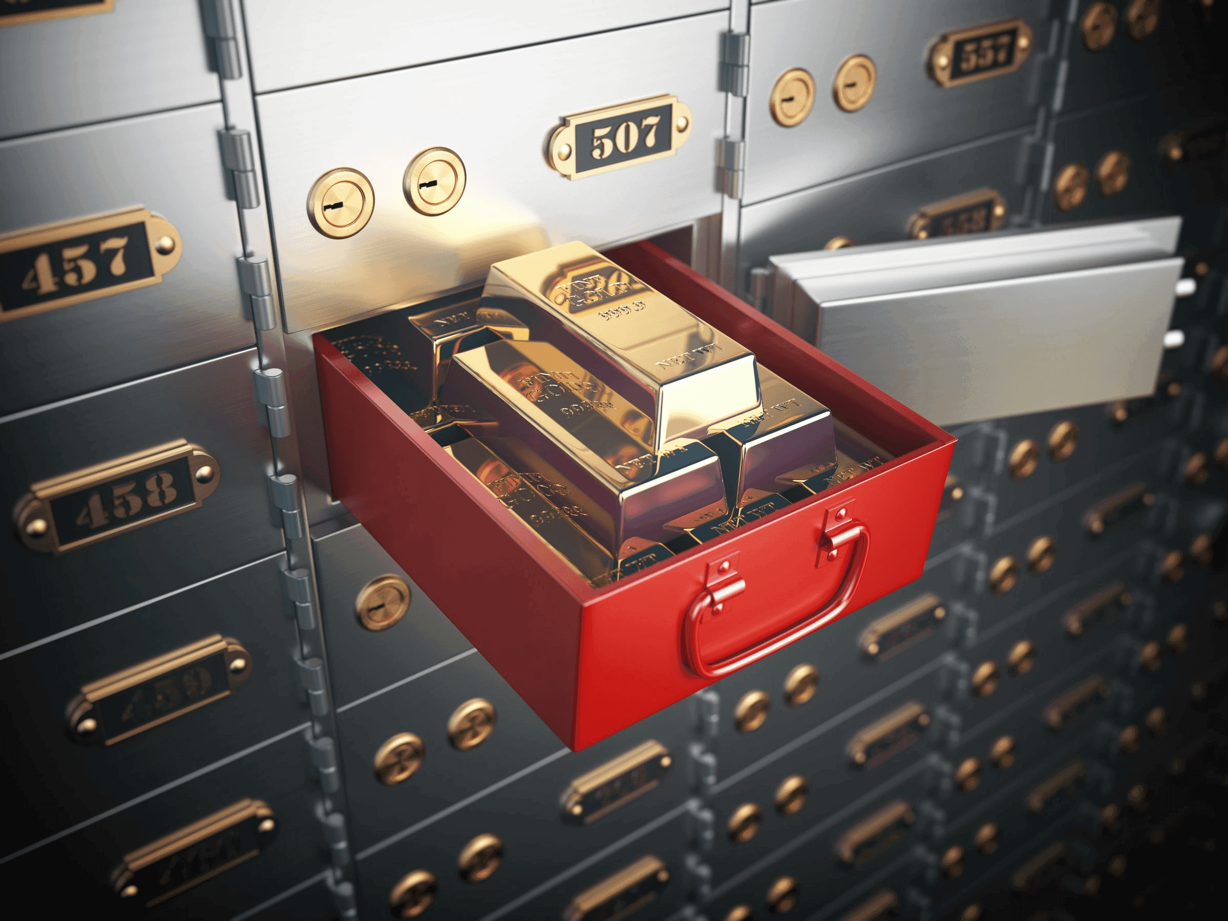 una cassetta di sicurezza rossa contenente pregiati lingotti d’oro fisico una cassetta di sicurezza rossa contenente pregiati lingotti d’oro fisico